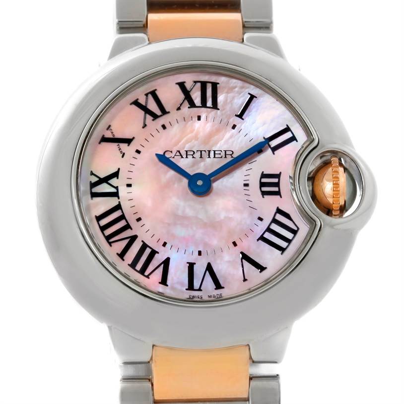 The image shows a close-up of the dial and crown of the Cartier Ballon Bleu W69011Z4 Women's Steel and Gold (two tone) Mother of Pearl Dial W69011Z4 Women's Steel and Gold (two tone) Mother of Pearl Dial watch.