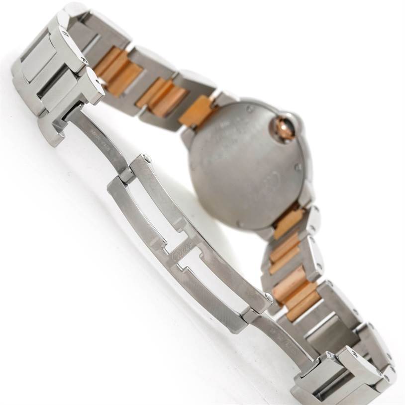 This image shows the back view of the Cartier Ballon Bleu W69011Z4 Women's Steel and Gold (two tone) Mother of Pearl Dial W69011Z4 Women's Steel and Gold (two tone) Mother of Pearl Dial watch, focusing on the clasp and stainless steel-and-gold bracelet.
