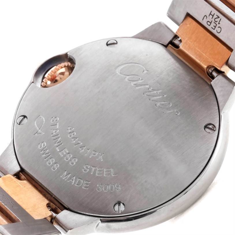 The image shows the back and part of the band of a Cartier Ballon Bleu W69011Z4 Women's Steel and Gold (two tone) Mother of Pearl Dial W69011Z4 Women's Steel and Gold (two tone) Mother of Pearl Dial watch from an angled close-up perspective.