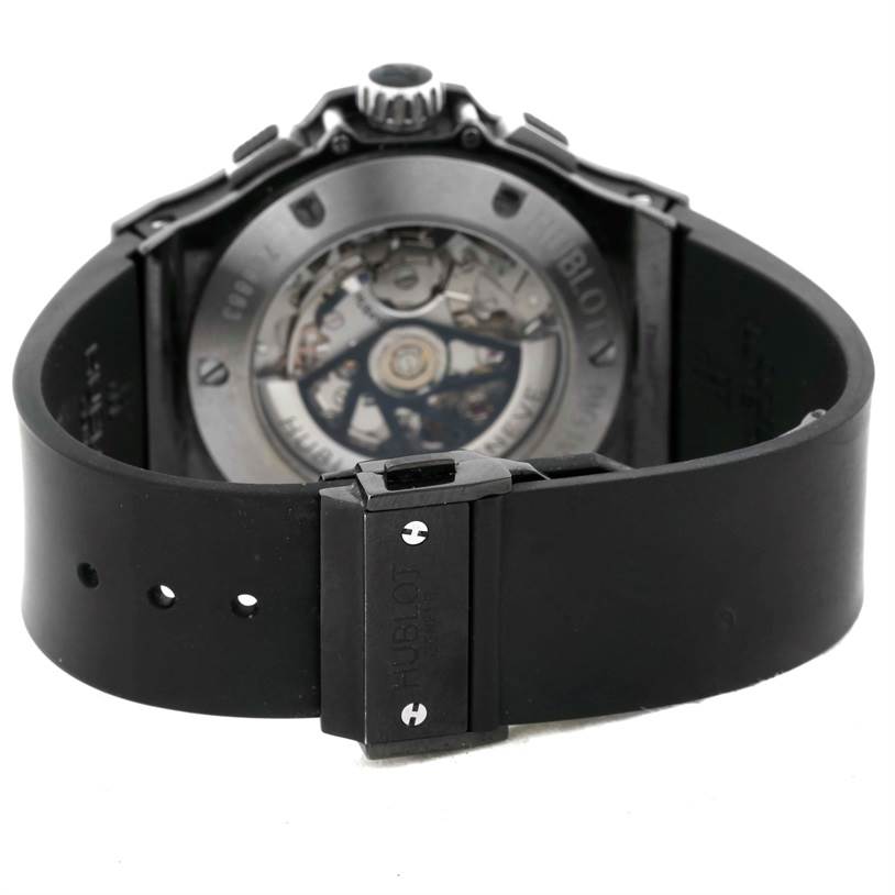 The image shows the back view of the Hublot Big Bang 301.CT.130.RX Men's Stainless Steel Black Dial 301.CT.130.RX Men's Stainless Steel Black Dial watch, highlighting its exposed movement and a portion of the strap and clasp.