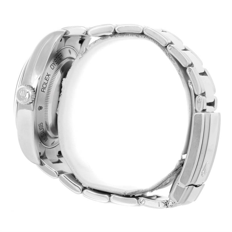 This Rolex Milgauss 116400V Men's Stainless Steel Black Dial 116400V Men's Stainless Steel Black Dial watch is shown from a side angle, displaying its bracelet, clasp, case back, and crown.