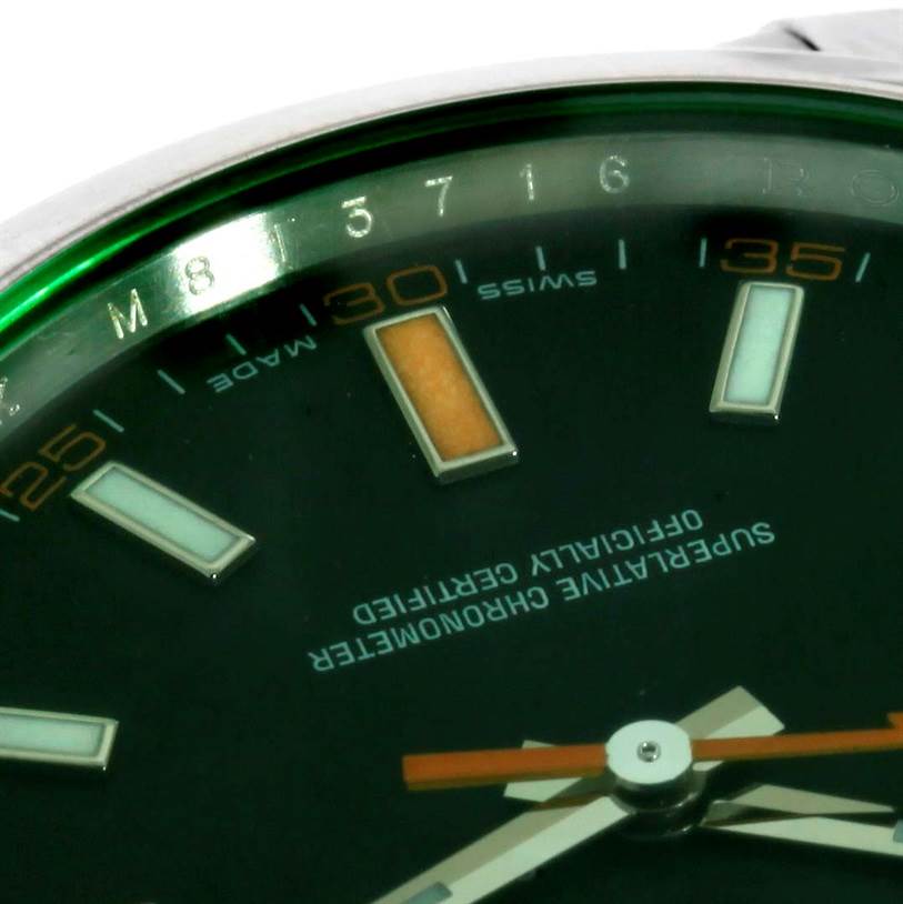 This image shows a close-up of the dial and hour markers of a Rolex Milgauss 116400V Men's Stainless Steel Black Dial 116400V Men's Stainless Steel Black Dial watch, viewed from an angle.