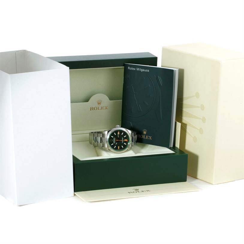 The image shows a Rolex Milgauss 116400V Men's Stainless Steel Black Dial 116400V Men's Stainless Steel Black Dial watch in its box, along with the booklet and outer packaging.