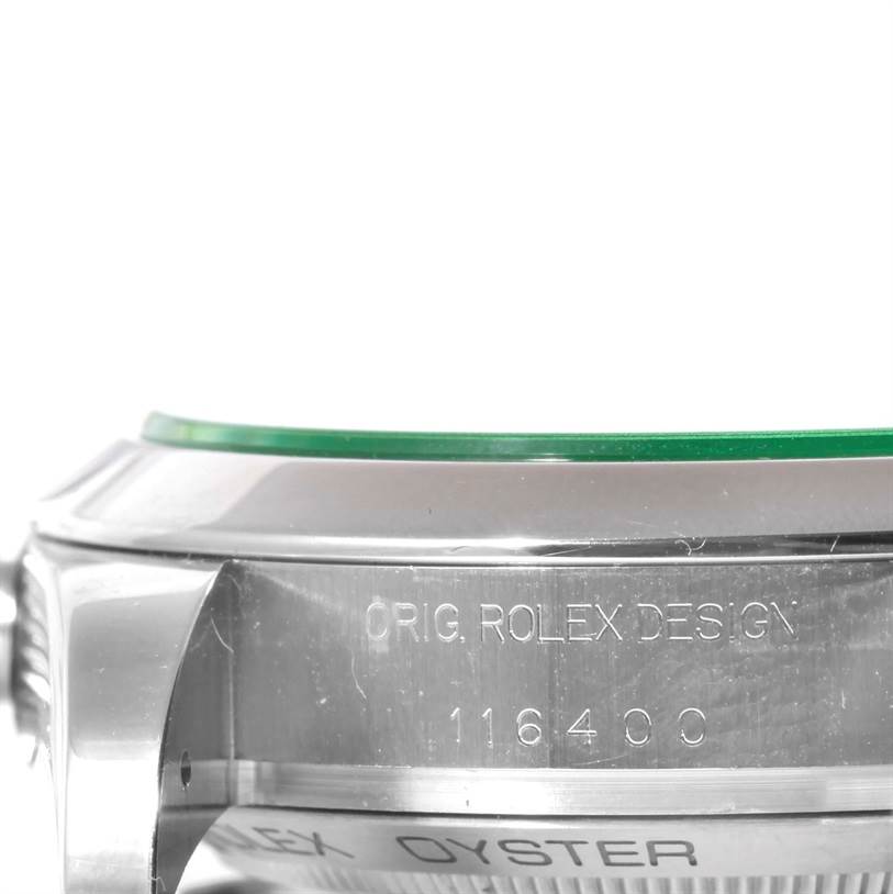 The image shows a close-up side view of a Rolex Milgauss 116400V Men's Stainless Steel Black Dial 116400V Men's Stainless Steel Black Dial watch case, highlighting the engraved model number and bezel.