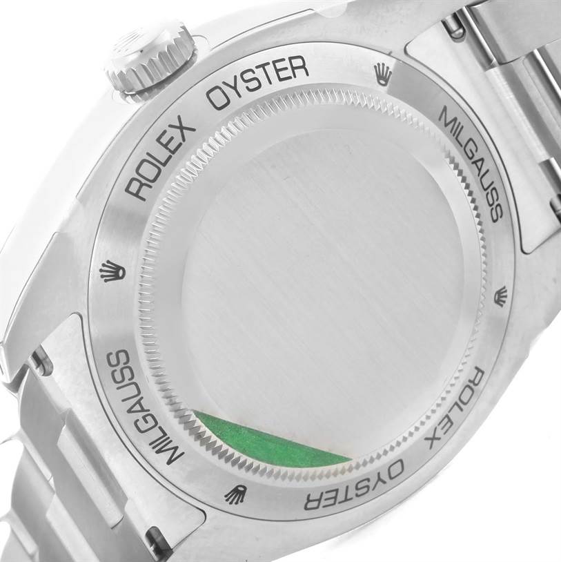 The image shows the back case of the Rolex Milgauss 116400GV Men's Stainless Steel Blue Dial 116400GV Men's Stainless Steel Blue Dial watch, focusing on the model name and brand engraving.