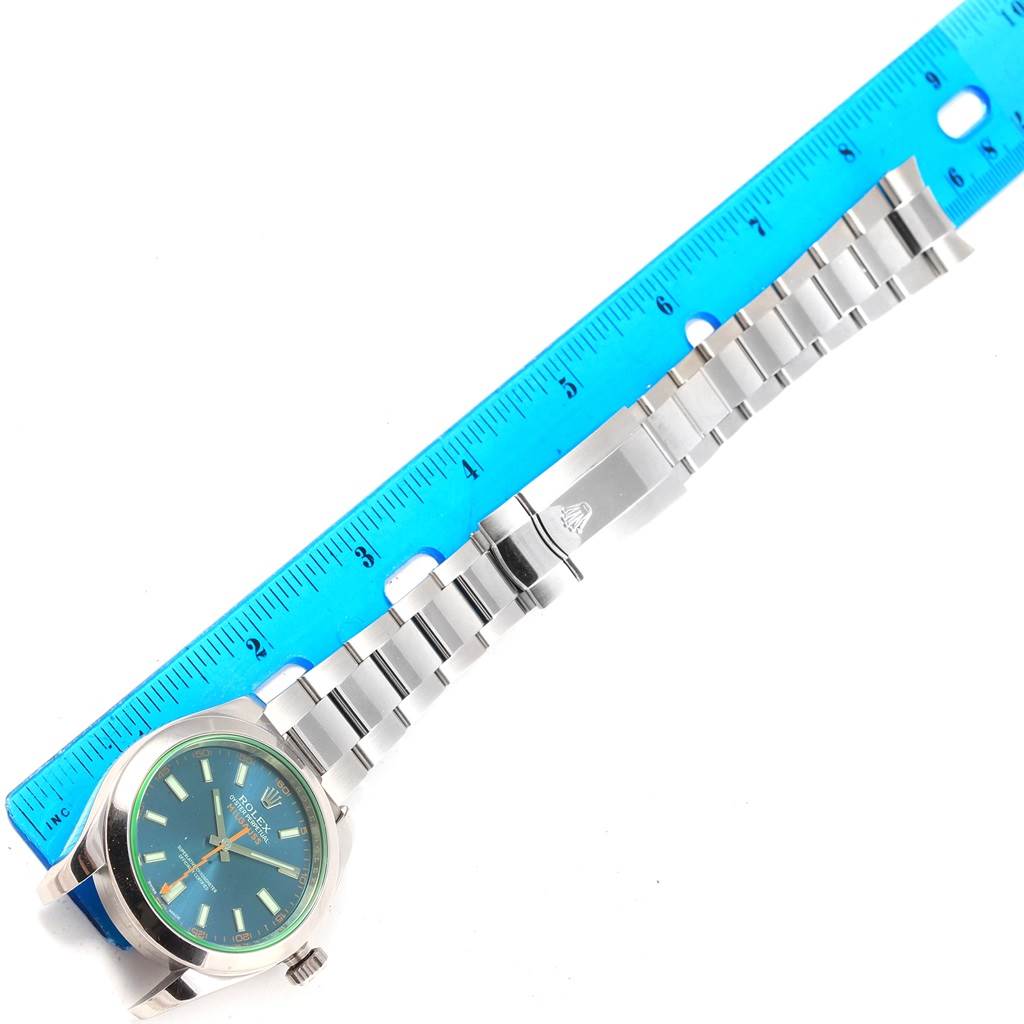 The Rolex Milgauss 116400GV Men's Stainless Steel Blue Dial 116400GV Men's Stainless Steel Blue Dial watch is shown from a top-down angle, displaying the face, bracelet, and clasp.