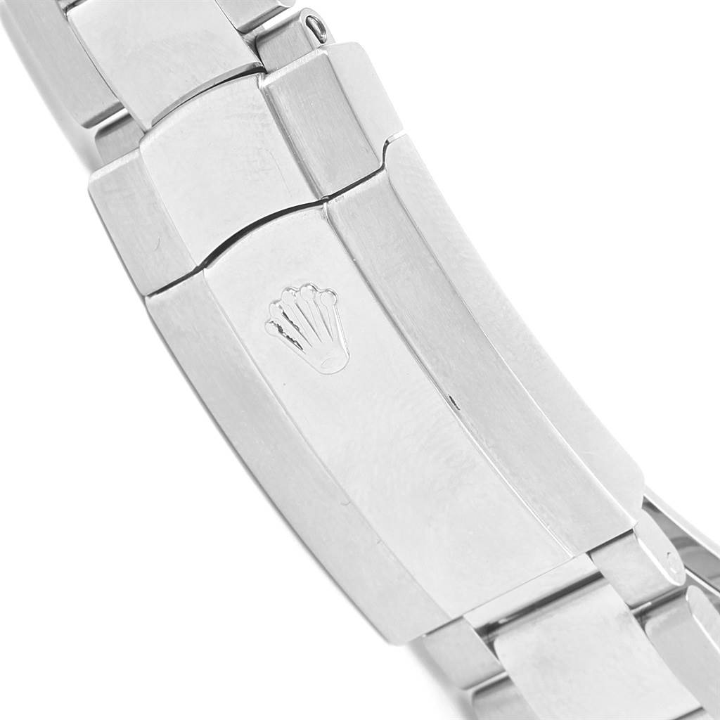 The image shows a close-up of the clasp and part of the bracelet of a Rolex Milgauss 116400GV Men's Stainless Steel Blue Dial 116400GV Men's Stainless Steel Blue Dial watch.