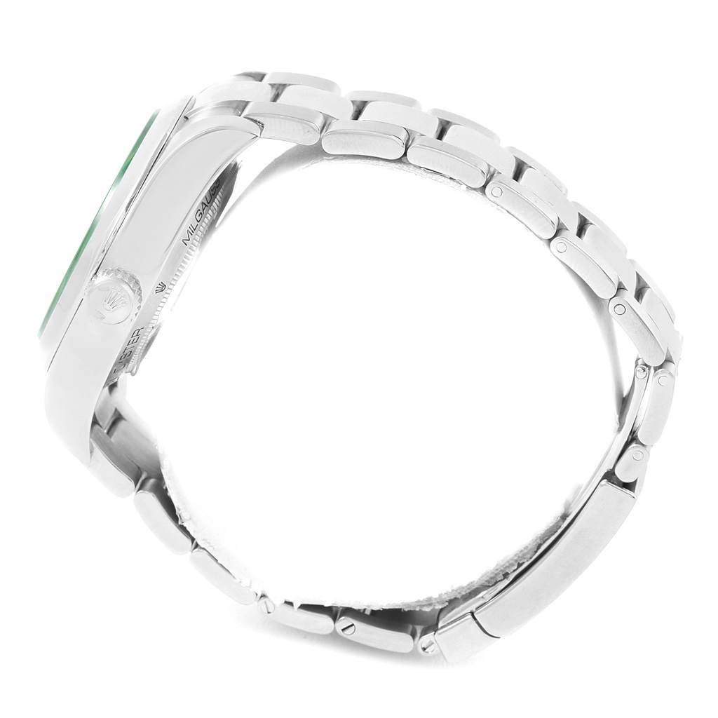 The image shows a Rolex Milgauss 116400GV Men's Stainless Steel Blue Dial 116400GV Men's Stainless Steel Blue Dial watch from a side angle, highlighting its metal bracelet and case.