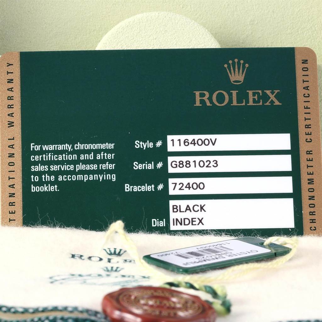 This image shows the warranty card and tags for a Rolex Milgauss 116400V Men's Stainless Steel Black Dial 116400V Men's Stainless Steel Black Dial model watch.