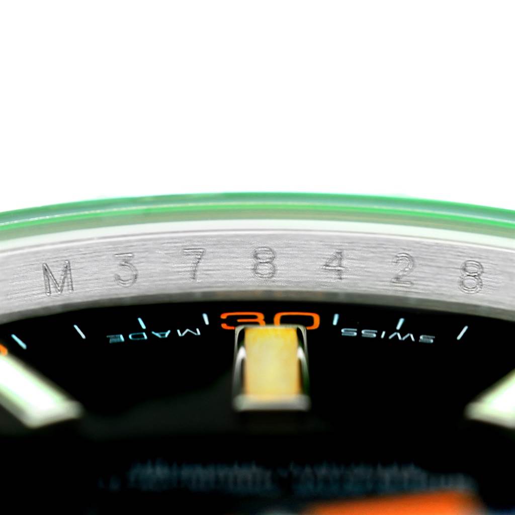 The image shows a close-up of the serial number and a portion of the dial with the "Swiss Made" text on the Rolex Milgauss 116400V Men's Stainless Steel Black Dial 116400V Men's Stainless Steel Black Dial watch.