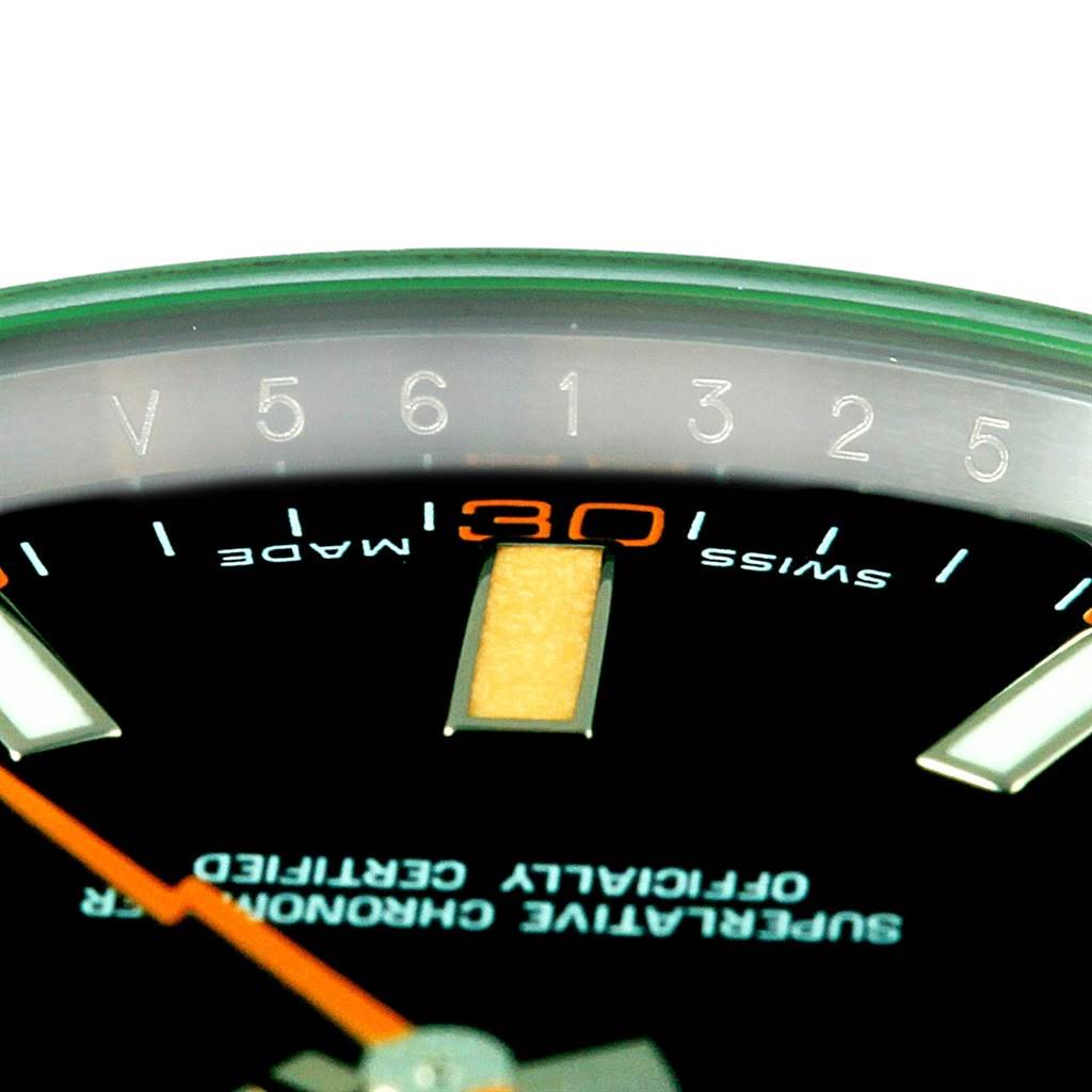 The image shows a close-up of the dial and bezel of a Rolex Milgauss 116400V Men's Stainless Steel Black Dial 116400V Men's Stainless Steel Black Dial watch, highlighting the numeral markers and text.