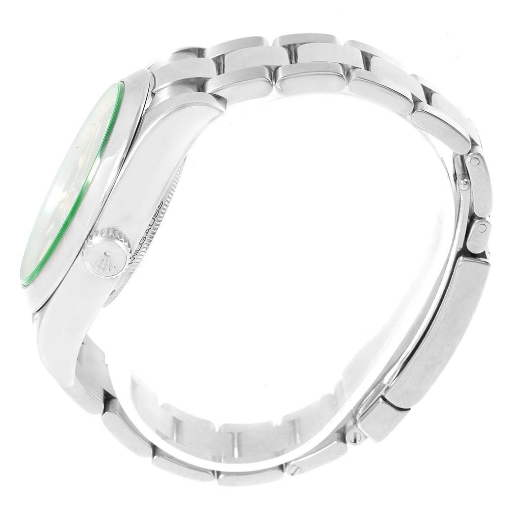 This side view of the Rolex Milgauss 116400V Men's Stainless Steel Black Dial 116400V Men's Stainless Steel Black Dial watch highlights its case with a visible crown and part of the bracelet.