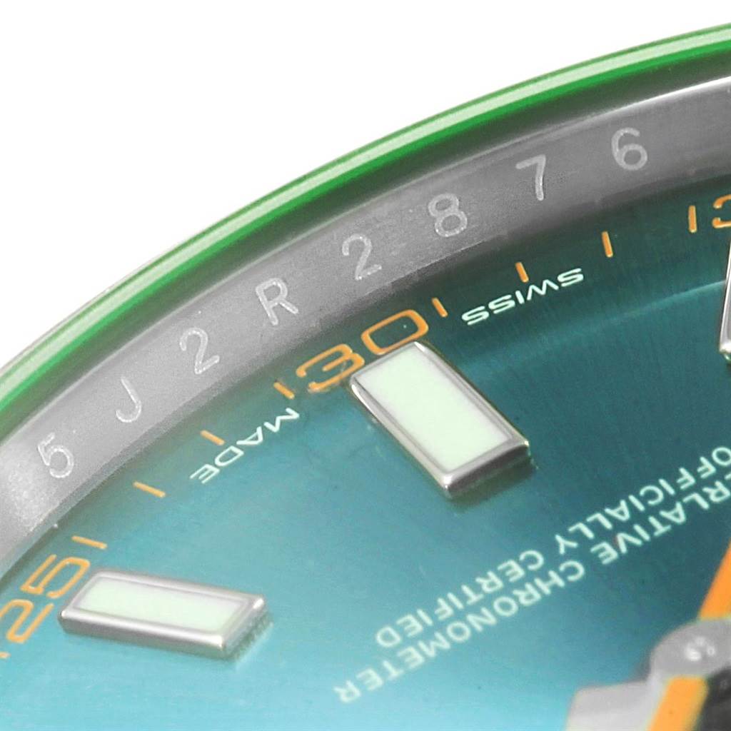 Close-up of the dial of a Rolex Milgauss 116400 Men's Stainless Steel Blue Dial 116400 Men's Stainless Steel Blue Dial watch, showing the hour markers, partial second markers, and "Swiss Made" text.