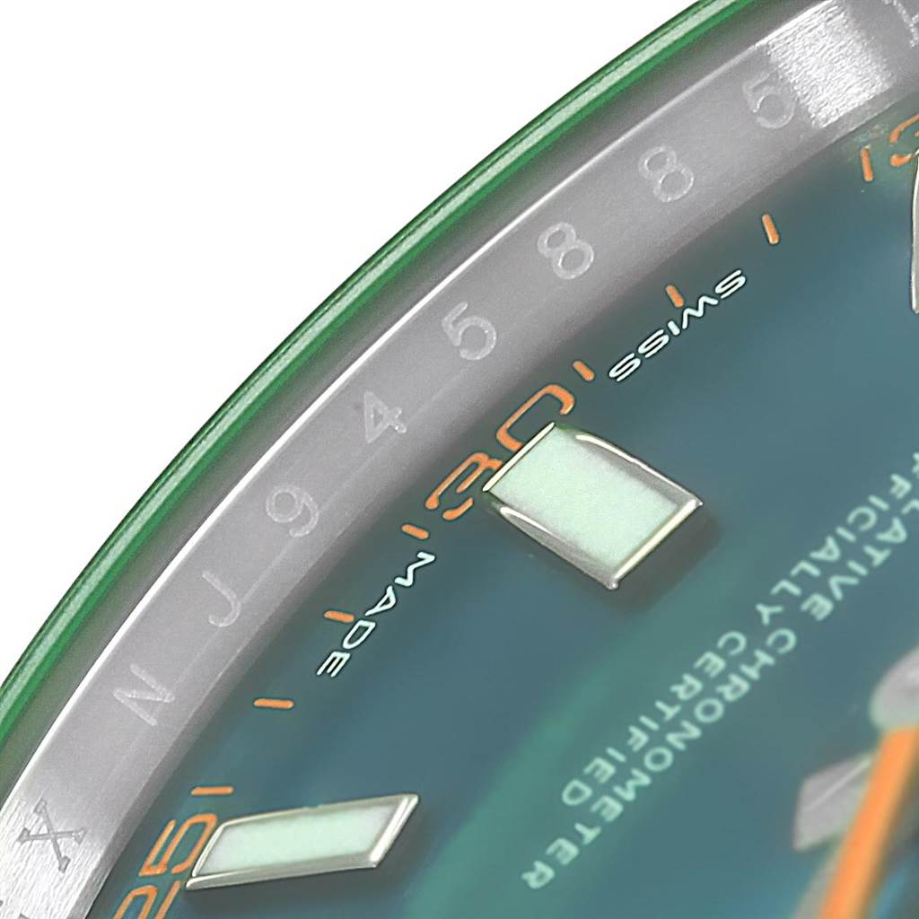 This close-up image of the Rolex Milgauss 116400GV Men's Stainless Steel Blue Dial 116400GV Men's Stainless Steel Blue Dial watch shows a section of the dial, featuring hour markers, minute markers, and part of the "Swiss Made" text.