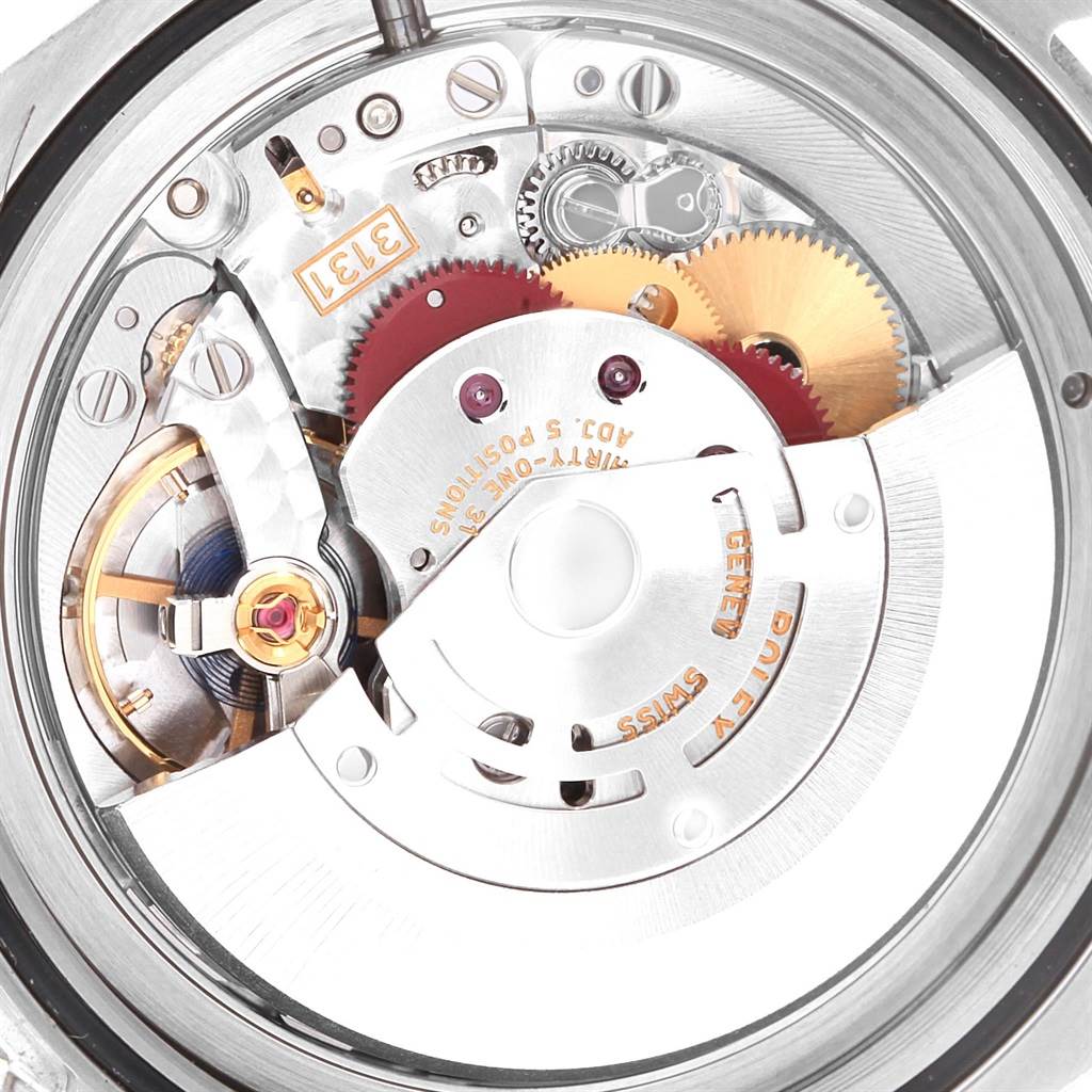 The image shows a close-up view of the Milgauss model by Rolex, focusing on its intricate internal mechanical movements.