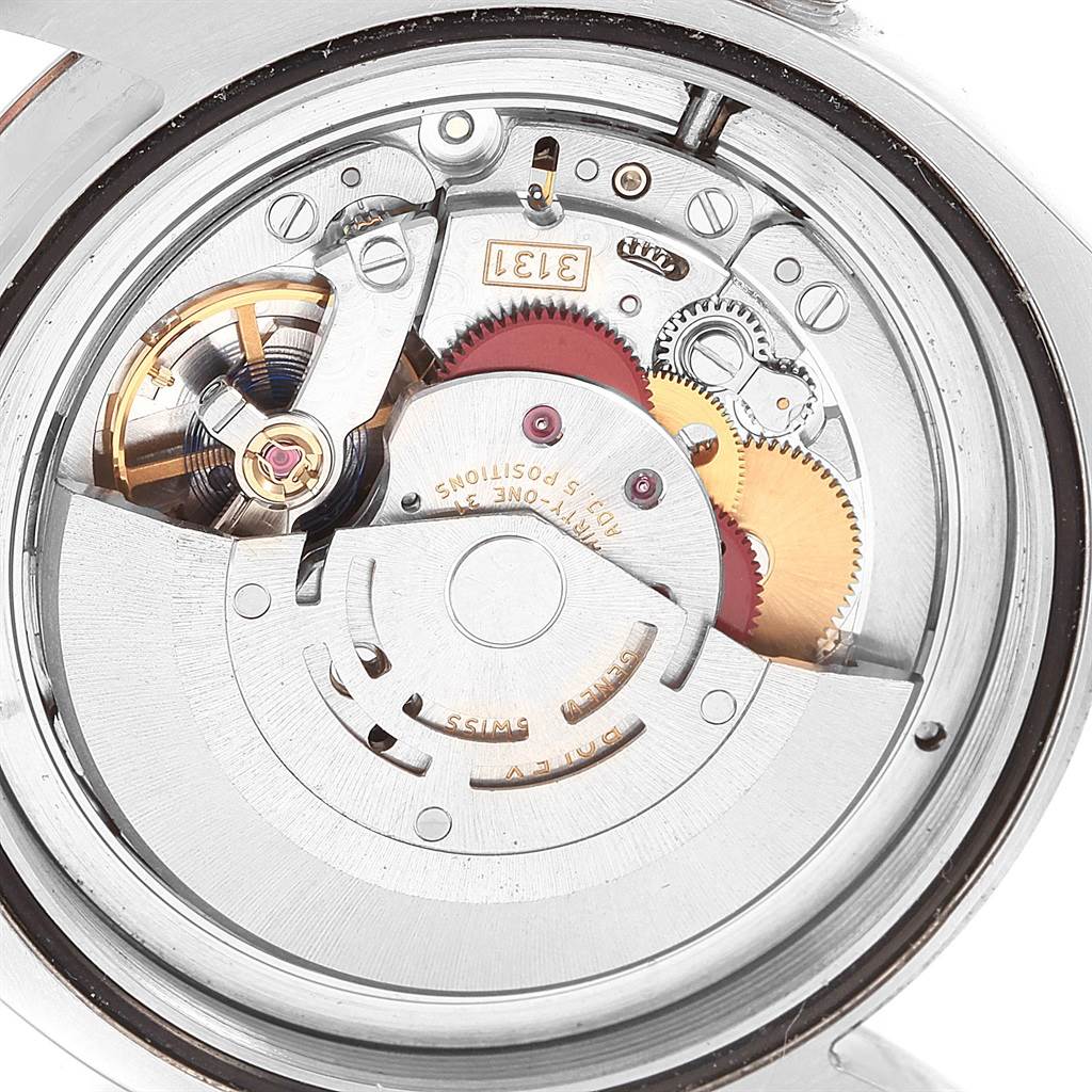 This image shows a close-up view of the movement mechanism inside a Rolex Milgauss 116400V Men's Stainless Steel Black Dial 116400V Men's Stainless Steel Black Dial watch.