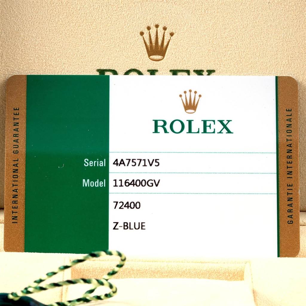 This image shows a close-up of the warranty card for a Rolex Milgauss 116400GV Men's Stainless Steel Blue Dial 116400GV Men's Stainless Steel Blue Dial model 116400GV.