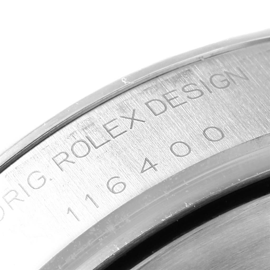 This close-up image shows the engraved inner bezel design of the Rolex Milgauss 116400GV Men's Stainless Steel Blue Dial 116400GV Men's Stainless Steel Blue Dial watch, displaying part of the model number.