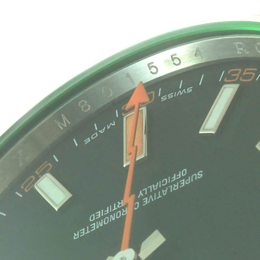 The image shows a close-up angle of the dial and second hand of a Rolex Milgauss 116400V Men's Stainless Steel Black Dial 116400V Men's Stainless Steel Black Dial watch.