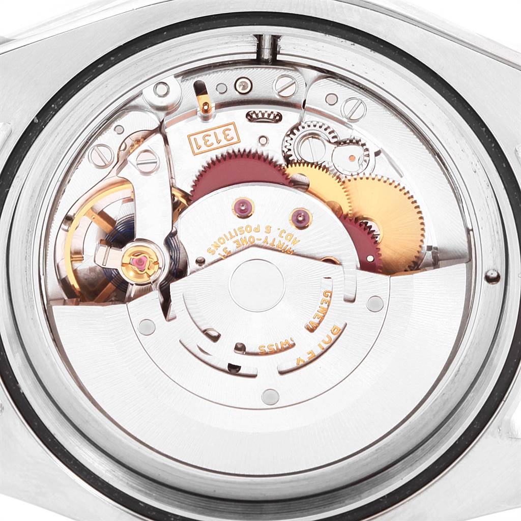 The image shows the intricate movement and inner components of the Rolex Milgauss 116400V Men's Stainless Steel Black Dial 116400V Men's Stainless Steel Black Dial watch from a back angle.