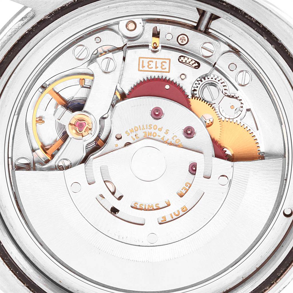 This is an interior view of the Milgauss model by Rolex, showcasing the movement and mechanical components.