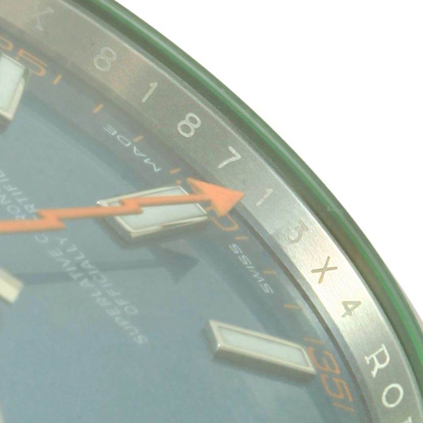 This image shows a close-up of the dial and minute markers of a Rolex Milgauss 116400GV Men's Stainless Steel Blue Dial 116400GV Men's Stainless Steel Blue Dial watch.