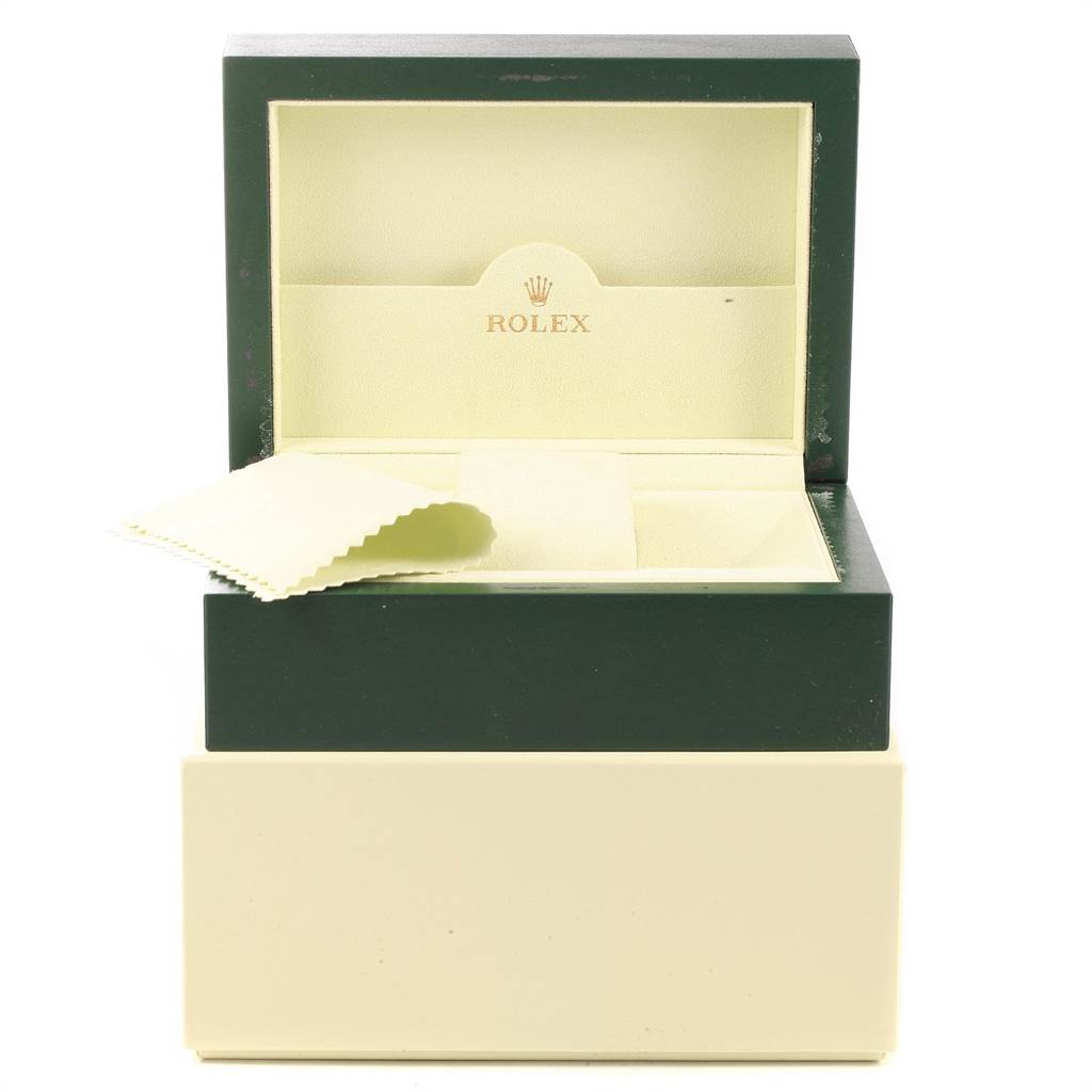 This image shows the opened packaging of the Rolex Milgauss 116400V Men's Stainless Steel Black Dial 116400V Men's Stainless Steel Black Dial watch, including the box and a cleaning cloth.