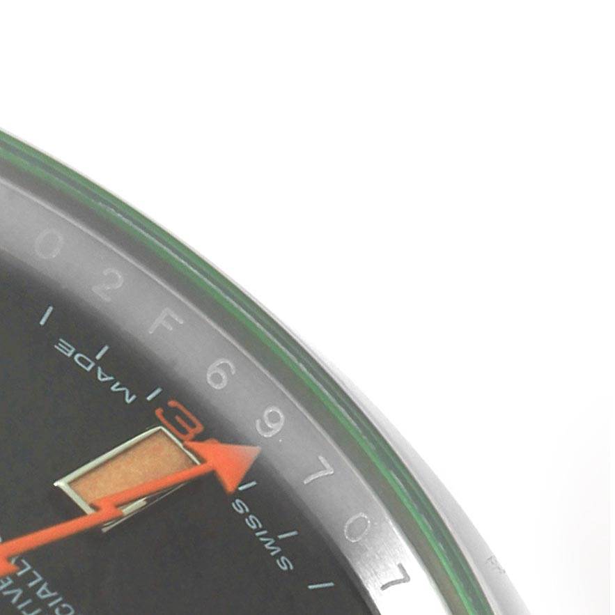 The image shows a close-up of the dial and bezel of the Rolex Milgauss 116400V Men's Stainless Steel Black Dial 116400V Men's Stainless Steel Black Dial watch, focusing on the 6 to 9 markers and the second hand.