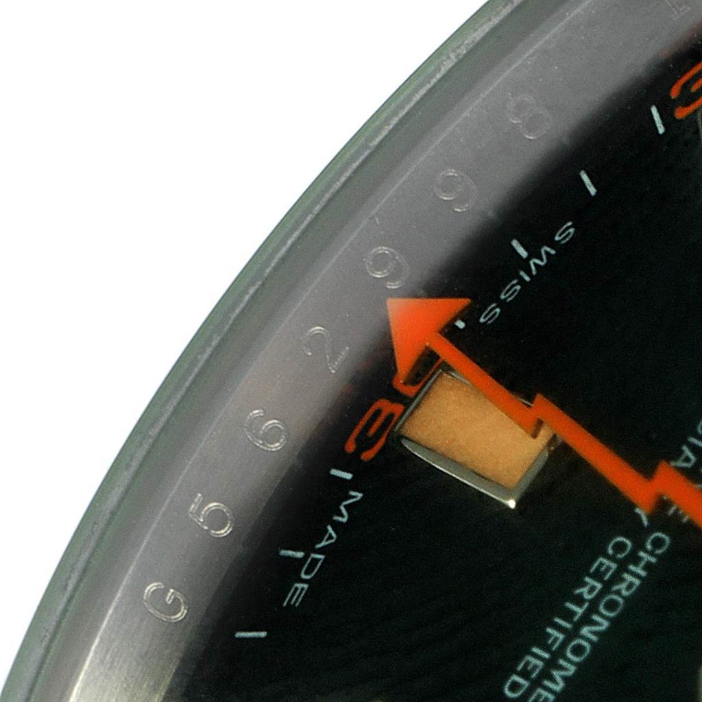 The close-up shows the dial and minute markers of the Rolex Milgauss 116400V Men's Stainless Steel Black Dial 116400V Men's Stainless Steel Black Dial watch, highlighting the orange seconds hand.
