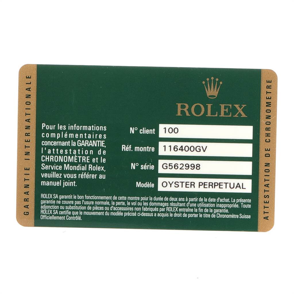 This image shows a Rolex warranty card for the Milgauss model 116400GV with serial number G562998.