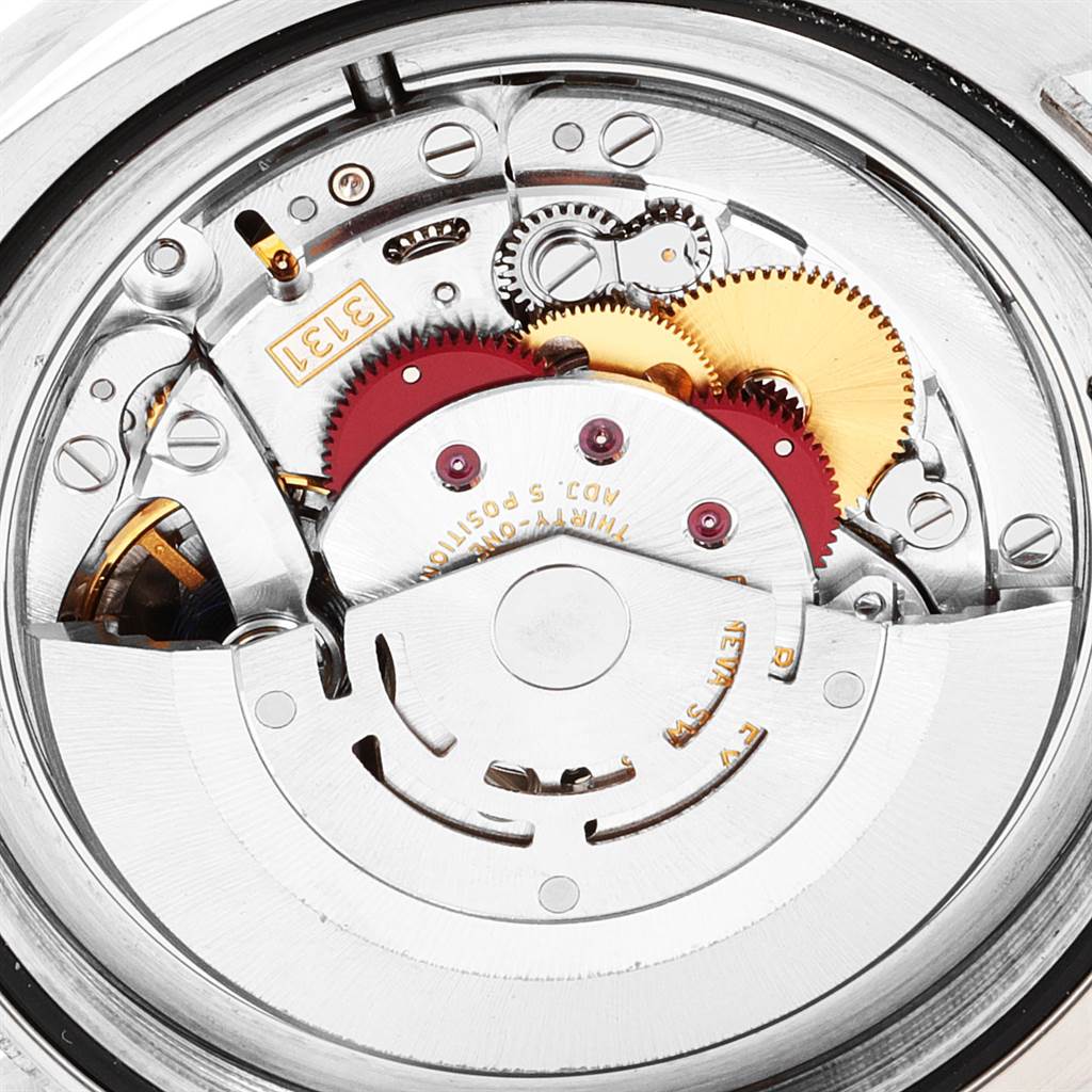 The image shows a close-up view of the movement and internal mechanics of a Rolex Milgauss 116400V Men's Stainless Steel Black Dial 116400V Men's Stainless Steel Black Dial watch.