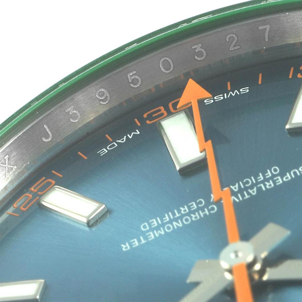 This close-up angle of a Rolex Milgauss 116400GV Men's Stainless Steel Blue Dial 116400GV Men's Stainless Steel Blue Dial watch shows part of the dial, hour markers, and orange lightning bolt second hand.