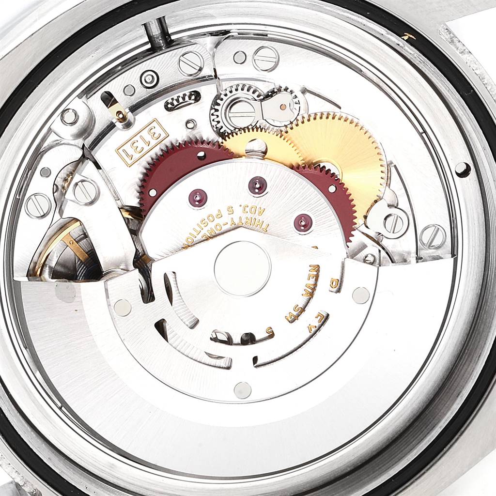 This image shows the internal mechanical movement of the Rolex Milgauss 116400GV Men's Stainless Steel Blue Dial 116400GV Men's Stainless Steel Blue Dial watch, focusing on gears and intricate components.