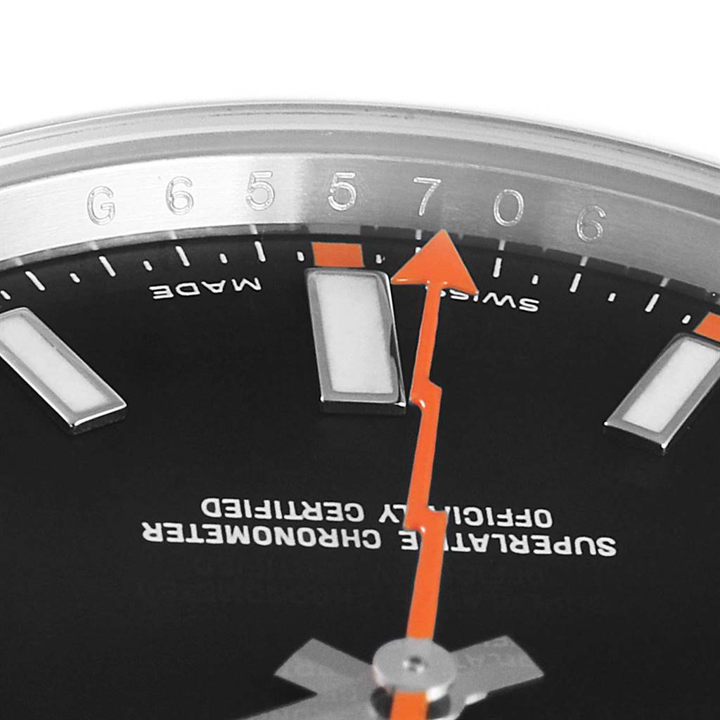 The image shows a close-up of the dial, orange seconds hand, and part of the bezel of a Rolex Milgauss 116400 Men's Stainless Steel Black Dial 116400 Men's Stainless Steel Black Dial watch.
