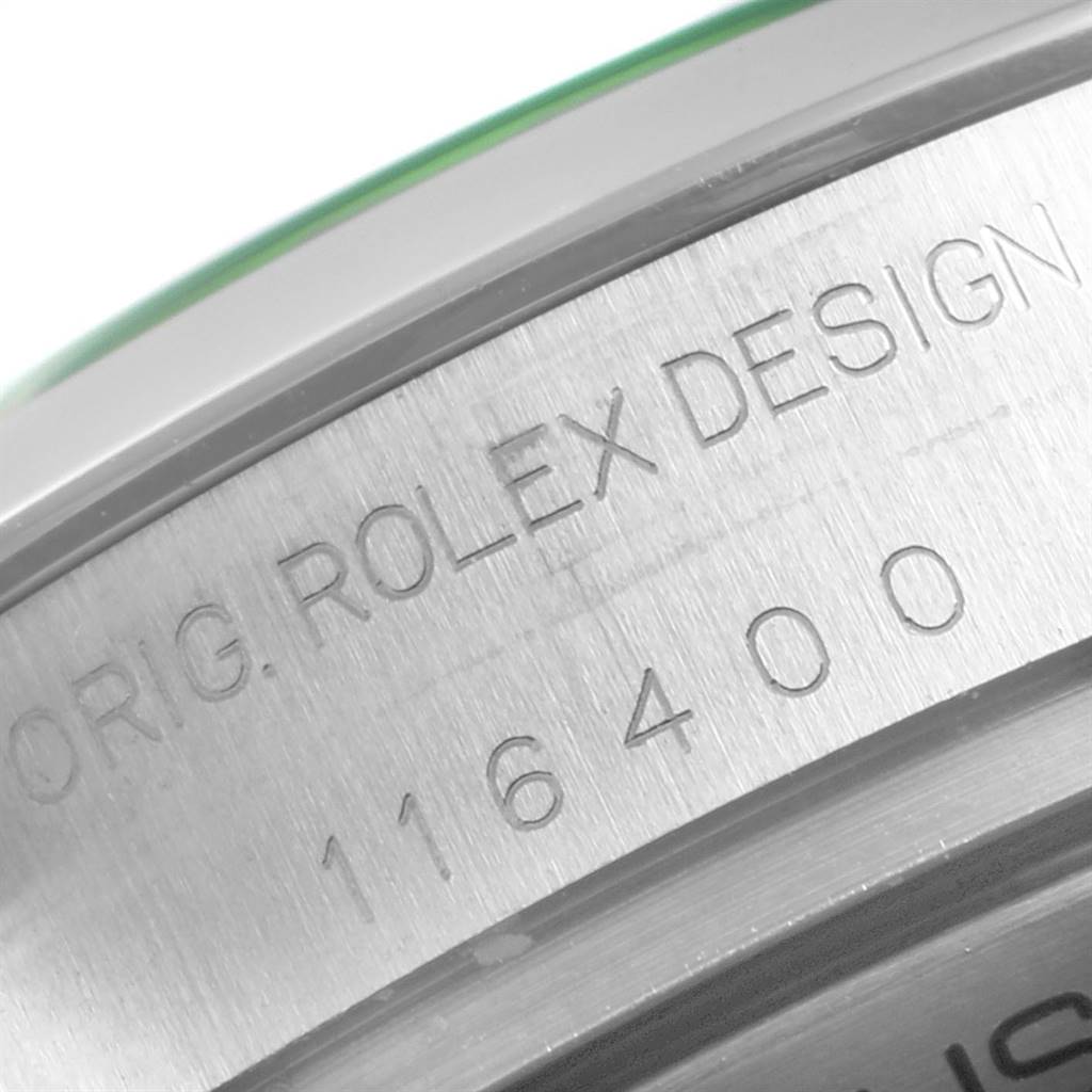 This image shows the engraved side of a Rolex Milgauss 116400GV Men's Stainless Steel Blue Dial 116400GV Men's Stainless Steel Blue Dial model with the serial number and "ORIG. ROLEX DESIGN" text.