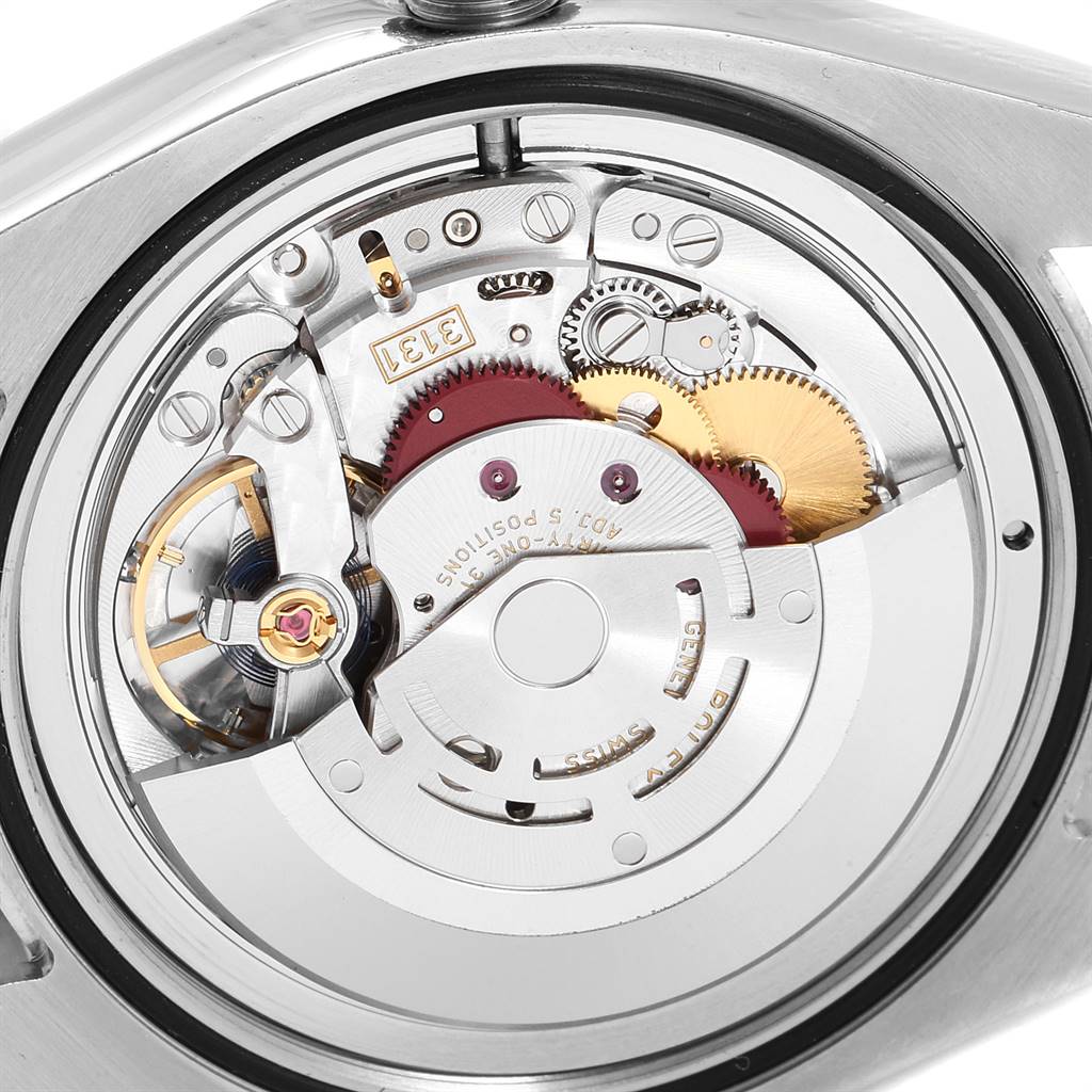 This image shows the intricate internal movement components of a Rolex Milgauss 116400GV Men's Stainless Steel Blue Dial 116400GV Men's Stainless Steel Blue Dial watch at a close-up angle.