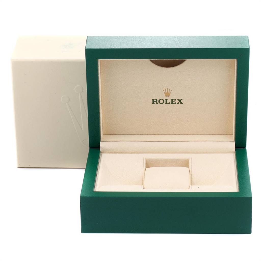 The image shows an open Rolex Milgauss 116400GV Men's Stainless Steel Blue Dial 116400GV Men's Stainless Steel Blue Dial watch box, displaying its green exterior and cream interior with the Rolex logo.