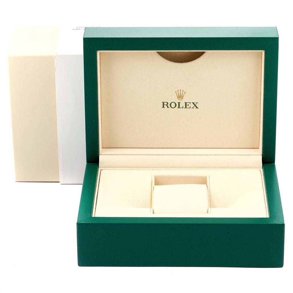The image shows a green and beige Rolex Milgauss 116400V Men's Stainless Steel Black Dial 116400V Men's Stainless Steel Black Dial watch box with its lid open, featuring the Rolex logo inside.