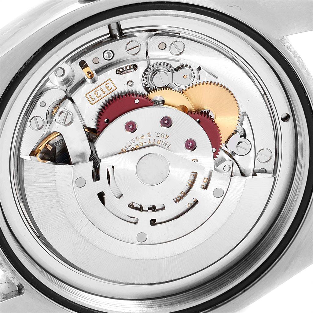 This image shows the internal mechanical movement of a Rolex Milgauss 116400V Men's Stainless Steel Black Dial 116400V Men's Stainless Steel Black Dial watch from a rear, close-up angle.