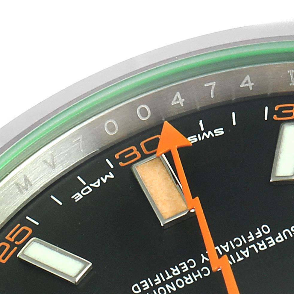 The image shows a close-up of the dial on a Rolex Milgauss 116400V Men's Stainless Steel Black Dial 116400V Men's Stainless Steel Black Dial, highlighting the seconds hand and printed minute markers.
