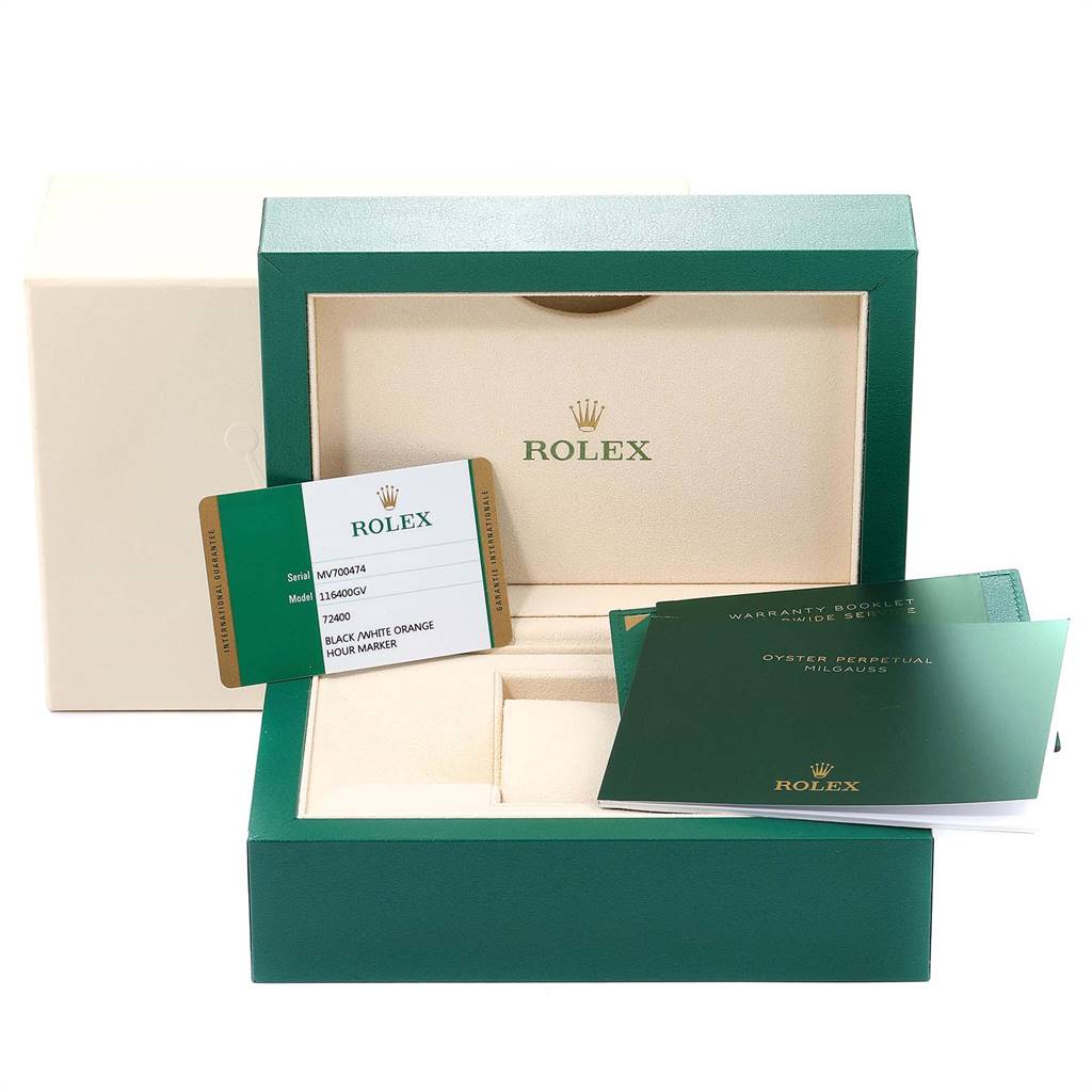 The image shows the packaging, warranty card, and booklets for a Rolex Milgauss 116400V Men's Stainless Steel Black Dial 116400V Men's Stainless Steel Black Dial watch.