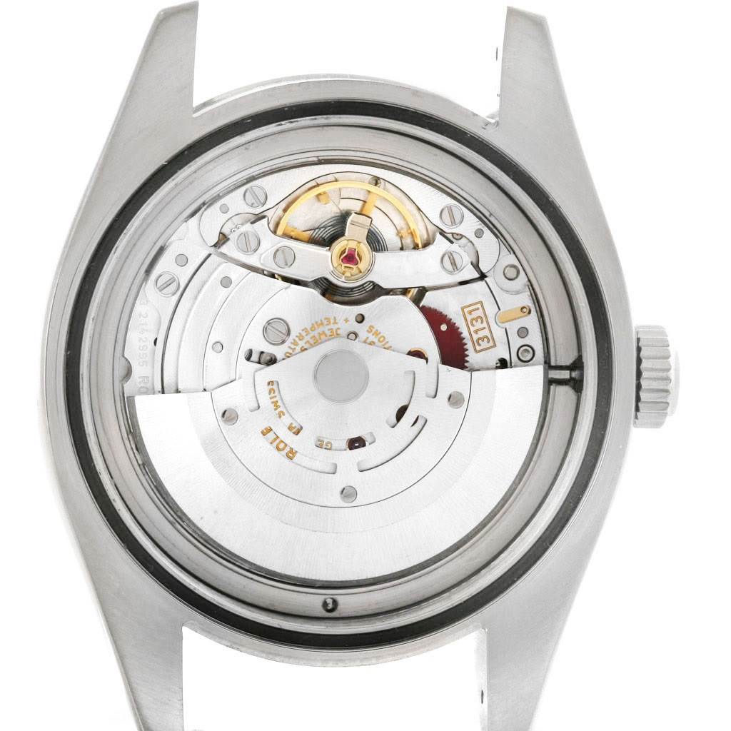 The image shows the internal movement mechanism of a Rolex Milgauss 116400WSO Men's Stainless Steel White Dial 116400WSO Men's Stainless Steel White Dial watch from a back view.