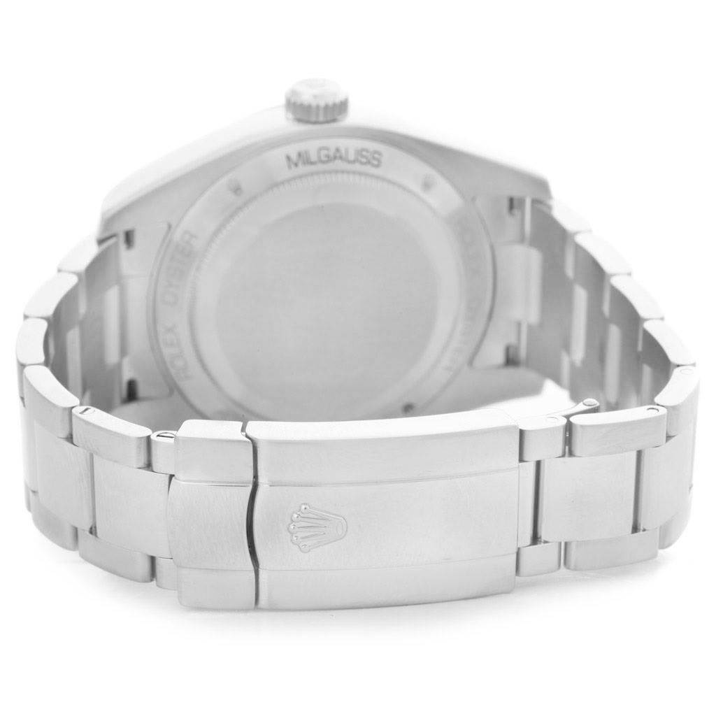 The image shows the back view of the Rolex Milgauss 116400WSO Men's Stainless Steel White Dial 116400WSO Men's Stainless Steel White Dial watch, including its case back, crown, and bracelet with a clasp.