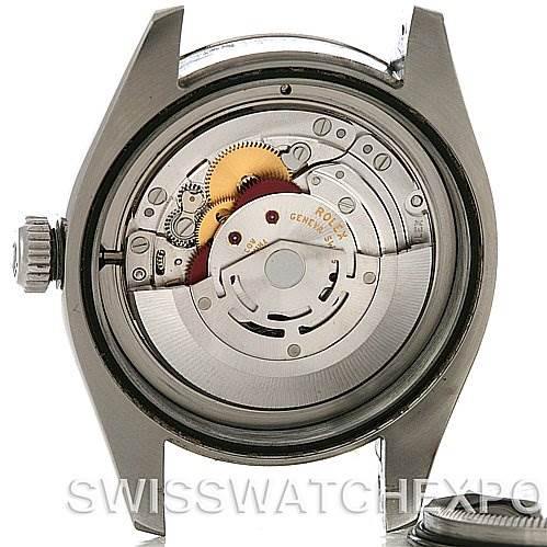 The image shows the open case back of a Rolex Milgauss 116400BKSO Men's Stainless Steel Black Dial 116400BKSO Men's Stainless Steel Black Dial, revealing its inner mechanical movement.