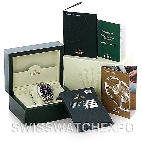 The image shows a Rolex Milgauss 116400BKSO Men's Stainless Steel Black Dial 116400BKSO Men's Stainless Steel Black Dial watch in its open box, surrounded by warranty booklets and service manuals from various angles.