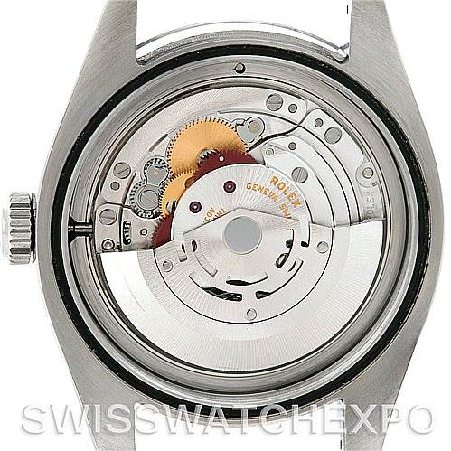 The image shows the back view of a Rolex Milgauss 116400V Men's Stainless Steel Black Dial 116400V Men's Stainless Steel Black Dial watch, highlighting its inner mechanical movement.