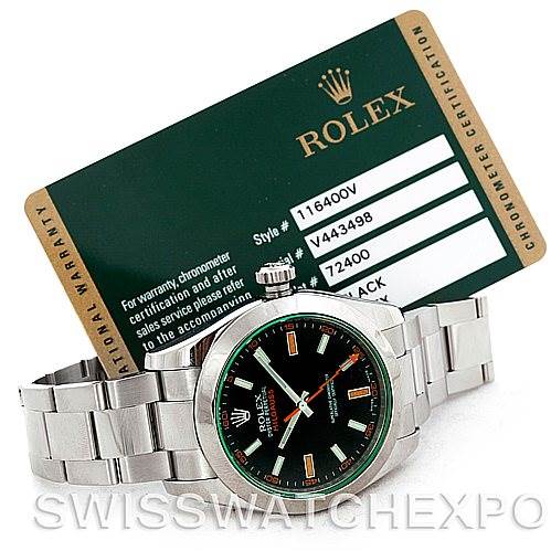 The Rolex Milgauss 116400V Men's Stainless Steel Black Dial 116400V Men's Stainless Steel Black Dial watch is displayed face-up with its stainless steel bracelet, alongside its chronometer certification card.