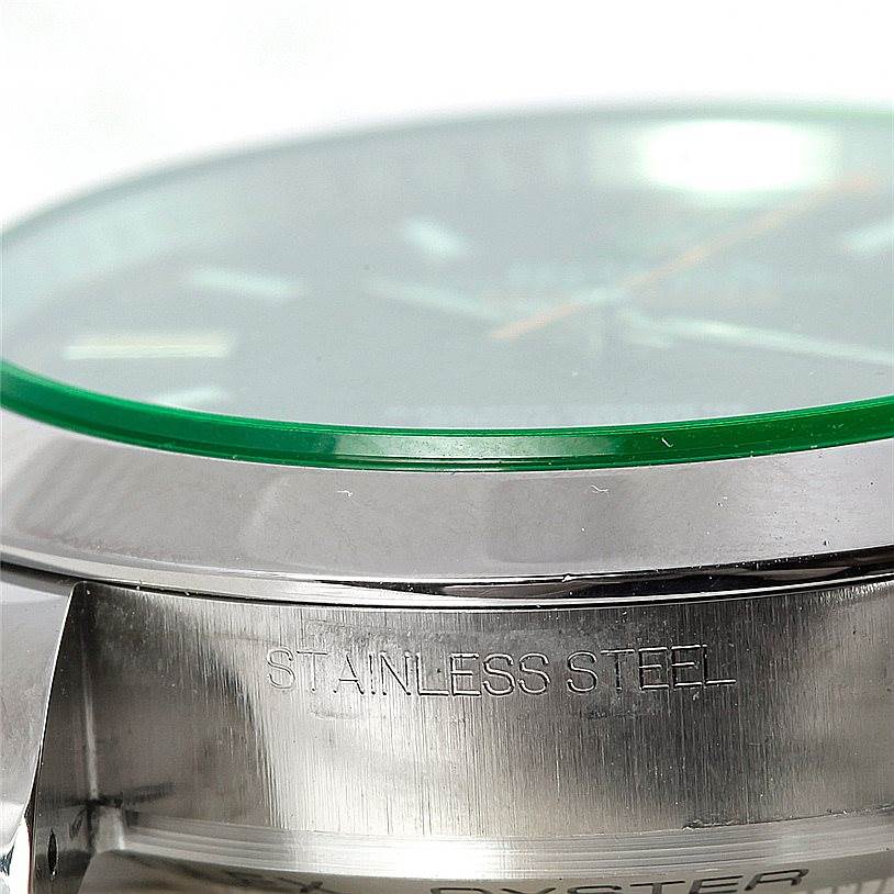 This image shows a close-up side view of the Rolex Milgauss 116400V Men's Stainless Steel Black Dial 116400V Men's Stainless Steel Black Dial watch, highlighting the bezel, case, and part of the glass.