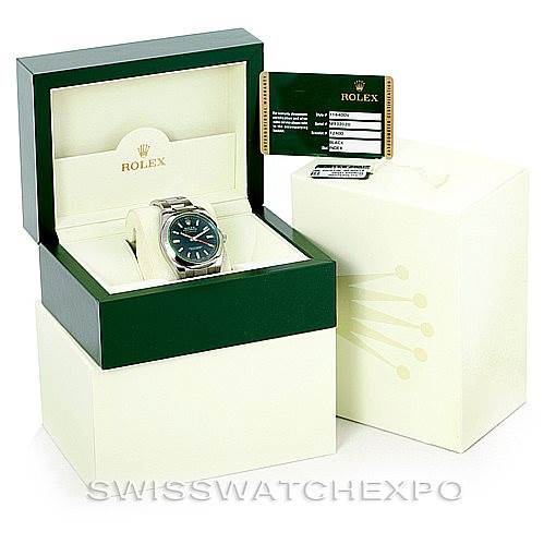 The Rolex Milgauss 116400V Men's Stainless Steel Black Dial 116400V Men's Stainless Steel Black Dial watch is displayed at a frontal angle, showing the box, outer packaging, and authenticity card.