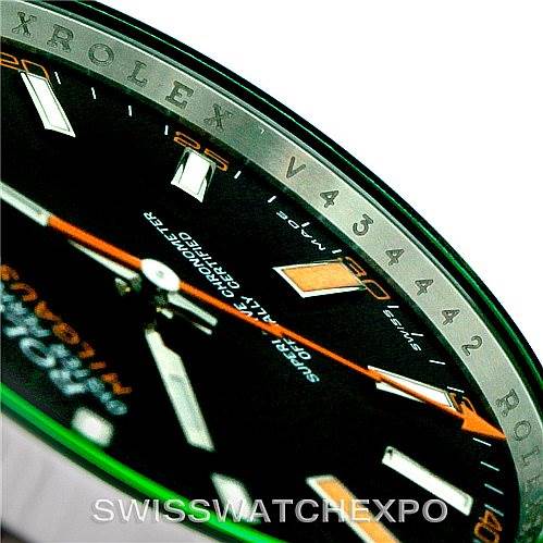 The image shows a close-up angle of the Rolex Milgauss 116400V Men's Stainless Steel Black Dial 116400V Men's Stainless Steel Black Dial watch face, highlighting the hour markers, orange lightning-bolt second hand, and bezel.